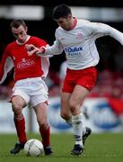24 February 2002; Davy Byrne of Shelbourne in action against Ollie Cahill of Cork City during the eircom League Premier Division match between Cork City and Shelbourne at Turners Cross in Cork. Photo by Matt Browne/Sportsfile