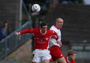 24 February 2002; Colin Patrick O'Brien of Cork City, goes up for the ball with Tony McCarthy of Shelbourne during the eircom League Premier Division match between Cork City and Shelbourne at Turners Cross in Cork. Photo by Matt Browne/Sportsfile