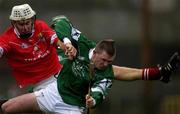 25 February 2002; Timmy McCarthy of Cork in action against Mark Foley of Limerick during the Allianz National Hurling League Division 1B Round 1 match between Limerick and Cork at the Gaelic Grounds in Limerick. Photo by Brendan Moran/Sportsfile