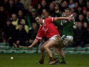25 February 2002; Alan Cummins of Cork in action against Ciaran Carey of Limerick during the Allianz National Hurling League Division 1B Round 1 match between Limerick and Cork at the Gaelic Grounds in Limerick. Photo by Brendan Moran/Sportsfile