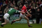 245 February 2002; Ben O'Connor of Cork, in action against Stephen McDonagh of Limerick during the Allianz National Hurling League Division 1B Round 1 match between Limerick and Cork at the Gaelic Grounds in Limerick. Photo by Brendan Moran/Sportsfile
