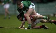 25 February 2002; Mark Foley of Limerick in action against Kieran Murphy of Cork during the Allianz National Hurling League Division 1B Round 1 match between Limerick and Cork at the Gaelic Grounds in Limerick. Photo by Brendan Moran/Sportsfile
