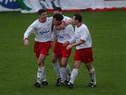 24 February 2002; John Burns of Shelbourne  celebrates with team-mates Davy Byrne,left, Jim Crawford and Stephen Geoghegan after scoring his sides first goal during the eircom League Premier Division match between Cork City and Shelbourne at Turners Cross in Cork. Photo by Matt Browne/Sportsfile