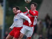 24 February 2002; Neal Horgan of Cork City, goes up for the ball with John Burns of Shelbourne during the eircom League Premier Division match between Cork City and Shelbourne at Turners Cross in Cork. Photo by Matt Browne/Sportsfile