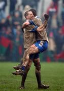 24 February 2002; Ballinderry players Enda Muldoon and Adrian McGuckin, right, celebrate following the AIB All-Ireland Senior Club Football Championship Semi-Final match between Ballinderry and Rathnew at Pearse Park in Longford. Photo by David Maher/Sportsfile