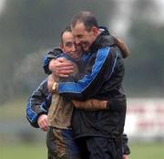 24 February 2002; Michael Wilson celebrates with his son Paul Wilson of Ballinderry following his side's victory over Rathnew in the AIB All-Ireland Senior Club Football Championship Semi-Final match between Ballinderry and Rathnew at Pearse Park in Longford. Photo by David Maher/Sportsfile