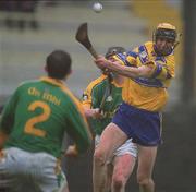 24 February 2002; Tony Griffin of Clare is tackled by Paul Donnelly and team-mate Ray Dorran of Meath during the Allianz National Hurling League Division 1 Round1 match between Clare and Meath at Pairc Tailteann in Navan, Meath. Photo by Aofie Rice/Sportsfile
