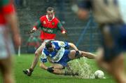 24 February 2002; Kevin McGuckin of Ballinderry in action against Stephen Byrne of Rathnew during the AIB All-Ireland Senior Club Football Championship Semi-Final match between Ballinderry and Rathnew at Pearse Park in Longford. Photo by David Maher/Sportsfile