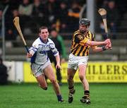 24 February 2002; J.J Delaney of Kilkenny in action against Ken McGrath of Waterford during Allianz National Hurling League Division 1A Round 1 match between Kilkenny and Waterford in Nowlan Park, Kilkenny. Photo by Damien Eagers/Sportsfile