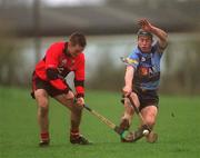 19 February 2002; Luke Mannix of UCC in action against Pat Fitzgerald of UCD during the Fitzgibbon Cup Final Replay match between UCD and UCC at McDonagh Park in Nenagh, Tipperary. Photo by Photo by Matt Browne/Sportsfile