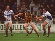 24 February 2002; Derek Lyng of Kilkenny, is tackled by Peter Queally, right, and Dan Shanahan of Waterford during Allianz National Hurling League Division 1A Round 1 match between Kilkenny and Waterford in Nowlan Park, Kilkenny. Photo by Damien Eagers/Sportsfile