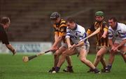 24 February 2002; Referee Ger Harrington throws the ball between Ken McGrath of Waterford and Kevin Power of Kilkenny during Allianz National Hurling League Division 1A Round 1 match between Kilkenny and Waterford in Nowlan Park, Kilkenny. Photo by Damien Eagers/Sportsfile