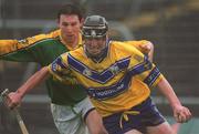 24 February 2002; Niall Giligan of Clare in action against Ray Dorran of Meath during the Allianz National Hurling League Division 1 Round1 match between Clare and Meath at Pairc Tailteann in Navan, Meath. Photo by Aofie Rice/Sportsfile