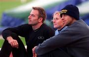 25 February 2002; Irish athletes, from left, Peter Coghlan, Karen Shinkins and Ciaran McDonagh, pictured listening to their coach Paul Doyle, with whom they all train at his training camp in Atlanta, Georgia, USA, during a training session at Morton Stadium in Dublin. Photo by Brian Lawless/Sportsfile