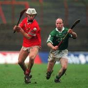 25 February 2002; Timmy McCarthy of Cork in action against Stephen McDonagh of Limerick during the Allianz National Hurling League Division 1B Round 1 match between Limerick and Cork at the Gaelic Grounds in Limerick. Photo by Brendan Moran/Sportsfile