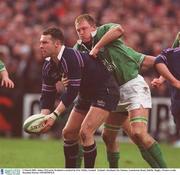 2 March 2002; James McLaren, Scotland is tackled by Eric Miller, Ireland.  Ireland v Scotland, Six Nations, Lansdowne Road, Dublin. Rugby. Picture credit; Brendan Moran / SPORTSFILE
