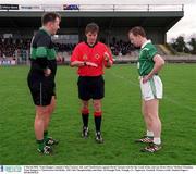 2 March 2002; Nemo Rangers captain Colin Corkery, left, and Charlestown captain David Tiernan wait for the result of the coin toss from referee Michael Monahan. Nemo Rangers v Charlestown Sarsfields, AIB Club Championship semi-final, McDonagh Park, Nenagh, Co. Tipperary. Football. Picture credit; Damien Eagers / SPORTSFILE
