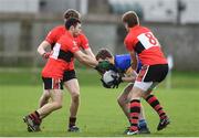 31 January 2017; Aaron Elliott of DCU St Patricks Campus is tackled by Stephen Cronin, left, Ronan O'Toole, centre, and Ian Maguire of University College Cork during the Independent.ie HE GAA Sigerson Cup Round 1 match between DCU St Patricks Campus and University College Cork at DCU Sportsgrounds in Dublin. Photo by Ramsey Cardy/Sportsfile