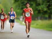 26 June 2011; Zhao Qi, China, in action during the Men's 20k race at the 18th Dublin International Grand Prix of Race Walking. Furze Road, Phoenix Park, Co. Dublin. Picture credit: Pat Murphy / SPORTSFILE