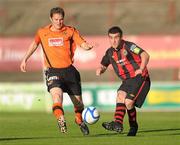 28 June 2011; Robert Bayly, Bohemians, in action against Jon Daly, Dundee United. Friendly, Bohemians v Dundee United, Dalymount Park, Dublin. Photo by Sportsfile