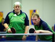 29 June 2011; Team Ireland's Robert Deegan, Ballinteer, Dublin, and his mixed doubles partner Carole Catling, Newtownabbey, Co. Antrim, in action during the qualifying rounds of the Table Tennis at the SEF Sport Training Halls, Peace & Friendship Stadium, Athens, Greece. 2011 Special Olympics World Summer Games, Athens, Greece. Picture credit: Ray McManus / SPORTSFILE
