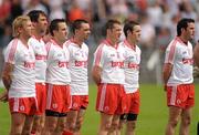 26 June 2011; Tyrone players, from left to right, Owen Mulligan, Joe McMahon, Mark Donnelly, Ryan McMenamin, Brian McGuigan, Martin Swift and David Harte during the playing of the National Anthem. Ulster GAA Football Senior Championship Semi-Final, Tyrone v Donegal, St Tiernach's Park, Clones, Co. Monaghan. Picture credit: Oliver McVeigh / SPORTSFILE