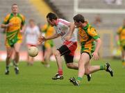 26 June 2011; Martin Swift, Tyrone, in action against Patrick McBrearty, Donegal. Ulster GAA Football Senior Championship Semi-Final, Tyrone v Donegal, St Tiernach's Park, Clones, Co. Monaghan. Picture credit: Oliver McVeigh / SPORTSFILE