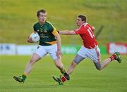 29 June 2011; Robert Farrelly, Meath, in action against Conall McKeever, Louth. Leinster GAA Football Minor Championship, Semi-Final, Meath v Louth, Pairc Tailteann, Navan, Co. Meath. Picture credit: Barry Cregg / SPORTSFILE