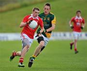 29 June 2011; Conall McKeever, Louth, in action against Barry McConnon, Meath. Leinster GAA Football Minor Championship, Semi-Final, Meath v Louth, Pairc Tailteann, Navan, Co. Meath. Picture credit: Barry Cregg / SPORTSFILE