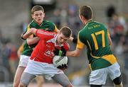 29 June 2011; Conall McKeever, Louth, in action against Shane Melia, left, and Barry McConnon, Meath. Leinster GAA Football Minor Championship, Semi-Final, Meath v Louth, Pairc Tailteann, Navan, Co. Meath. Picture credit: Barry Cregg / SPORTSFILE