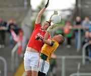 29 June 2011; John Horan, Louth, attempts to palm the ball past Meath goalkeeper Robert Burlingham. Leinster GAA Football Minor Championship, Semi-Final, Meath v Louth, Pairc Tailteann, Navan, Co. Meath. Picture credit: Barry Cregg / SPORTSFILE