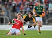 29 June 2011; Ciaran Byrne, Louth, gathers the ball in open play, despite the efforts of Anthony Forde, Meath. Leinster GAA Football Minor Championship, Semi-Final, Meath v Louth, Pairc Tailteann, Navan, Co. Meath. Picture credit: Barry Cregg / SPORTSFILE