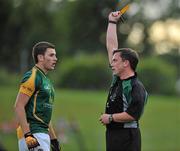 29 June 2011; Referee Fergal Barry shows a second yellow card to Neil Shorthall, Meath, before issuing the red card and sending him off. Leinster GAA Football Minor Championship, Semi-Final, Meath v Louth, Pairc Tailteann, Navan, Co. Meath. Picture credit: Barry Cregg / SPORTSFILE