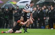 3 February 2017; Ryan Lomas of Cistercian College Roscrea is tackled by Robert Ivers of CBC Monkstown during the Bank of Ireland Leinster Schools Senior Cup Round 1 match between Cistercian College Roscrea and CBC Monkstown at Castle Avenue in Clontarf, Dublin. Photo by Piaras Ó Mídheach/Sportsfile