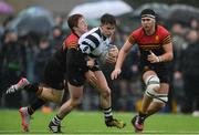 3 February 2017; Finbarr Crowley of Cistercian College Roscrea in action against Shane O’Hanrahan, left, and Eóin Vaughan of CBC Monkstown during the Bank of Ireland Leinster Schools Senior Cup Round 1 match between Cistercian College Roscrea and CBC Monkstown at Castle Avenue in Clontarf, Dublin. Photo by Piaras Ó Mídheach/Sportsfile