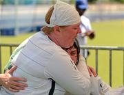 30 June 2011; Christine Kelly, left, Ballinasloe, Co. Galway, consoles her friend and Team Ireland 5-A-Side team-mate Fionnuala Treacy, also from Ballinasloe, after Ireland were beaten by Greece 1-0 in a qualifying game at the Hellinikon Olympic Hockey Venue, Hellinikon Olympic Complex, Athens, Greece. 2011 Special Olympics World Summer Games, Athens, Greece. Picture credit: Ray McManus / SPORTSFILE