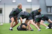 30 June 2011; Connacht's TJ Anderson, left, and Matt Jarvis collide as Johnny O'Connor, bottom, retains possession. Connacht Rugby squad training session ahead of their 2011/12 season. Sportsground, Galway. Picture credit: Matt Browne / SPORTSFILE