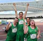2 July 2011; The Silver Medal winning Team Ireland 4x100m team, from left to right, Martin Mahood, Bangor, Co. Down, Timothy Morahan, Rathmines, Dublin, Eileen O'Loughlin, Rathanghan, Co. Kildare and Ciara O'Loughlin, Inagh, Co. Clare, celebrate at the OAKA Olympic Stadium, Athens Olympic Sport Complex. 2011 Special Olympics World Summer Games, Athens, Greece. Picture credit: Ray McManus / SPORTSFILE