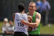 2 July 2011; Ireland's Paul Hession, right, with Luke Fagan, Great Britain, after the Men's 100m at the Cork City Sports 2011. CIT Arena, Bishopstown, Cork. Picture credit: Brendan Moran / SPORTSFILE