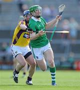 2 July 2011; Seamus Hickey, Limerick, in action against Malachy Travers, Wexford. GAA Hurling All-Ireland Senior Championship, Phase 2, Limerick v Wexford, Gaelic Grounds, Limerick. Picture credit: Matt Browne / SPORTSFILE