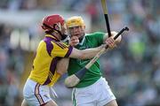 2 July 2011; James Ryan, Limerick, in action against Paul Roche, Wexford. GAA Hurling All-Ireland Senior Championship, Phase 2, Limerick v Wexford, Gaelic Grounds, Limerick. Picture credit: Matt Browne / SPORTSFILE