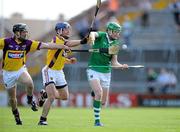 2 July 2011; Seamus Hickey, Limerick, in action against Darren Stamp, left, and Malachy Travers, Wexford. GAA Hurling All-Ireland Senior Championship, Phase 2, Limerick v Wexford, Gaelic Grounds, Limerick. Picture credit: Matt Browne / SPORTSFILE