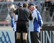 2 July 2011; Referee Michael Wadding consults with his umpires before sending off Wexford's Paul Roche for an off the ball incident with Graeme Mulcahy, Limerick. GAA Hurling All-Ireland Senior Championship, Phase 2, Limerick v Wexford, Gaelic Grounds, Limerick. Picture credit: Matt Browne / SPORTSFILE
