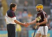 2 July 2011; Galway manager John McIntyre shake hands with Ger Farragher as he is substituted during the second half. GAA Hurling All-Ireland Senior Championship, Phase 2, Galway v Clare, Pearse Stadium, Salthill, Galway. Picture credit: Stephen McCarthy / SPORTSFILE