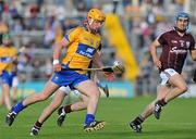 2 July 2011; John Conlon, Clare, in action against Adrian Cullinane, left, and Donal Barry, right, Galway. GAA Hurling All-Ireland Senior Championship, Phase 2, Galway v Clare, Pearse Stadium, Galway. Picture credit: Barry Cregg / SPORTSFILE