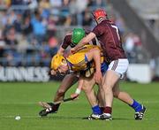 2 July 2011; John Conlon, Clare, in action against Adrian Cullinane, right, and David Burke, left, Galway. GAA Hurling All-Ireland Senior Championship, Phase 2, Galway v Clare, Pearse Stadium, Galway. Picture credit: Barry Cregg / SPORTSFILE