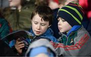 4 February 2017; Young Mayo supporters examine the program before the Allianz Football League Division 1 Round 1 match between Mayo and Monaghan at Elverys MacHale Park in Castlebar, Co Mayo. Photo by Stephen McCarthy/Sportsfile