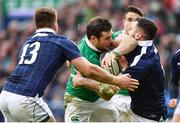 4 February 2017; Robbie Henshaw of Ireland is tackled by Huw Jones, left, and Alex Dunbar of Scotland during the RBS Six Nations Rugby Championship match between Scotland and Ireland at BT Murrayfield Stadium in Edinburgh, Scotland. Photo by Ramsey Cardy/Sportsfile