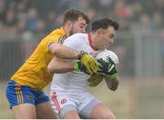 5 February 2017; Cathal McCarron of Tyrone in action against Ultan Harney of Roscommon during the Allianz Football League Division 1 Round 1 match between Tyrone and Roscommon at Healy Park in Omagh, Co. Tyrone. Photo by Oliver McVeigh/Sportsfile