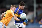 5 February 2017; Philip Austin of Tipperary in action against Peter Healy of Antrim during the Allianz Football League Division 3 Round 1 match between Tipperary and Antrim at Semple Stadium in Thurles, Co. Tipperary. Photo by Matt Browne/Sportsfile